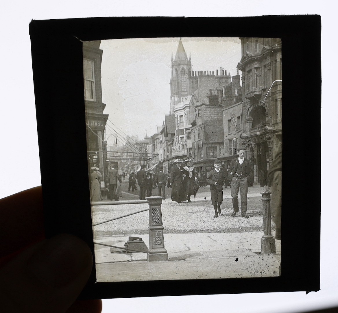 A large quantity of various glass slides to include locations, architecture, ships, locomotives etc.